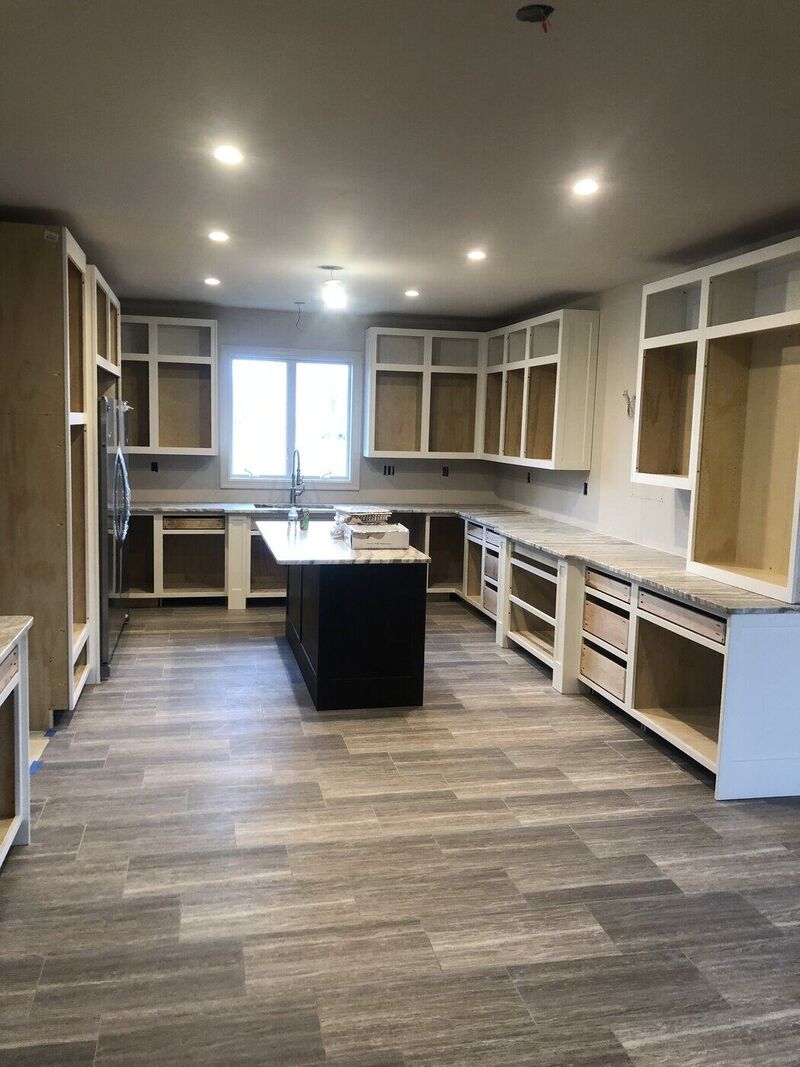 Wood-Plank Floors and Built Shower