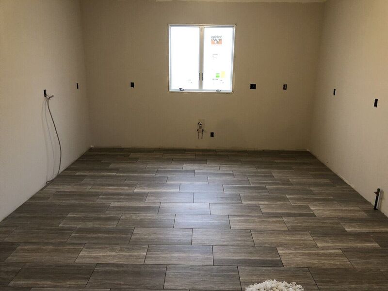 Kitchen, Wood-Plank Floors and Built Shower