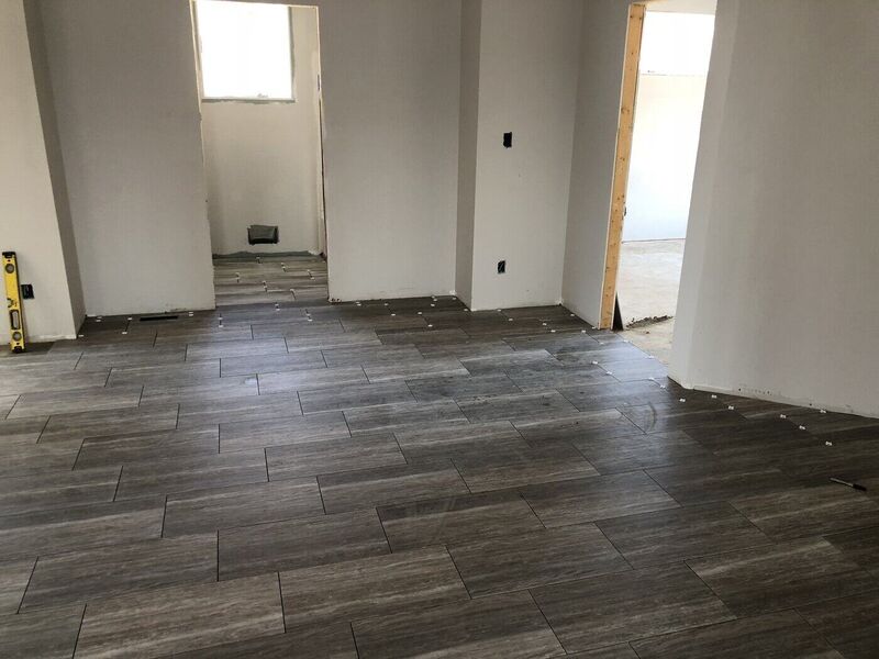 Entry, Wood-Plank Floors and Built Shower